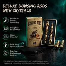 Deluxe dowsing rods with crystals in packaging on a dark background