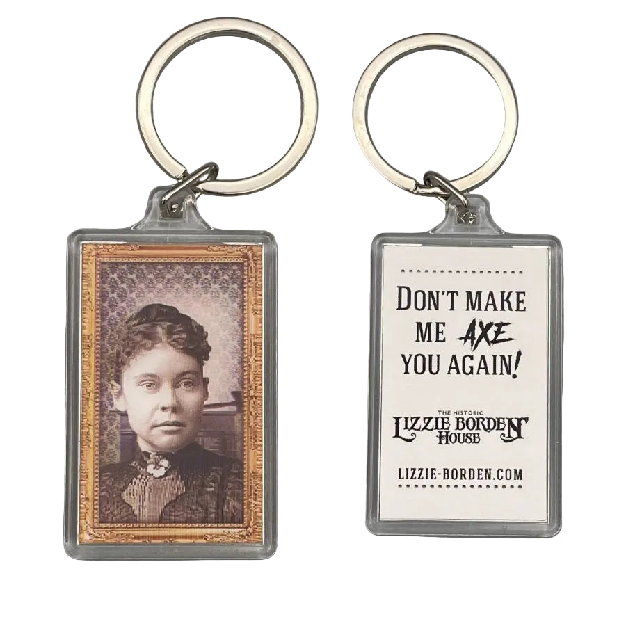 The Lizzie Face Key Chain features a captivating holographic finish that shimmers in the light.
