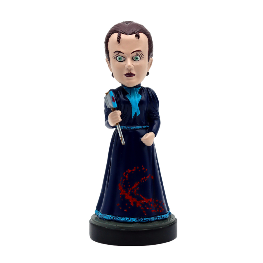 Bobblehead figure of Lizzie Borden in a dark blue dress with red accents on a white background