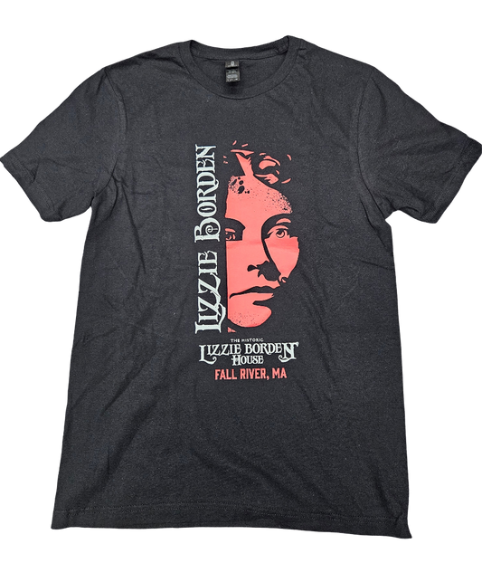 The "Lizzie Red Face" T-Shirt by US Ghost Adventures features a bold red portrait of Lizzie Borden on the front and their iconic logo on the back, perfect for ghost hunting enthusiasts to express their passion for the spooky and mysterious.